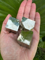 three pyrite cubes
