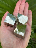three pyrite cubes
