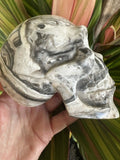 Polished Zebra Onyx Skull Carving – Banded Aragonite / Calcite (1.5 lbs)